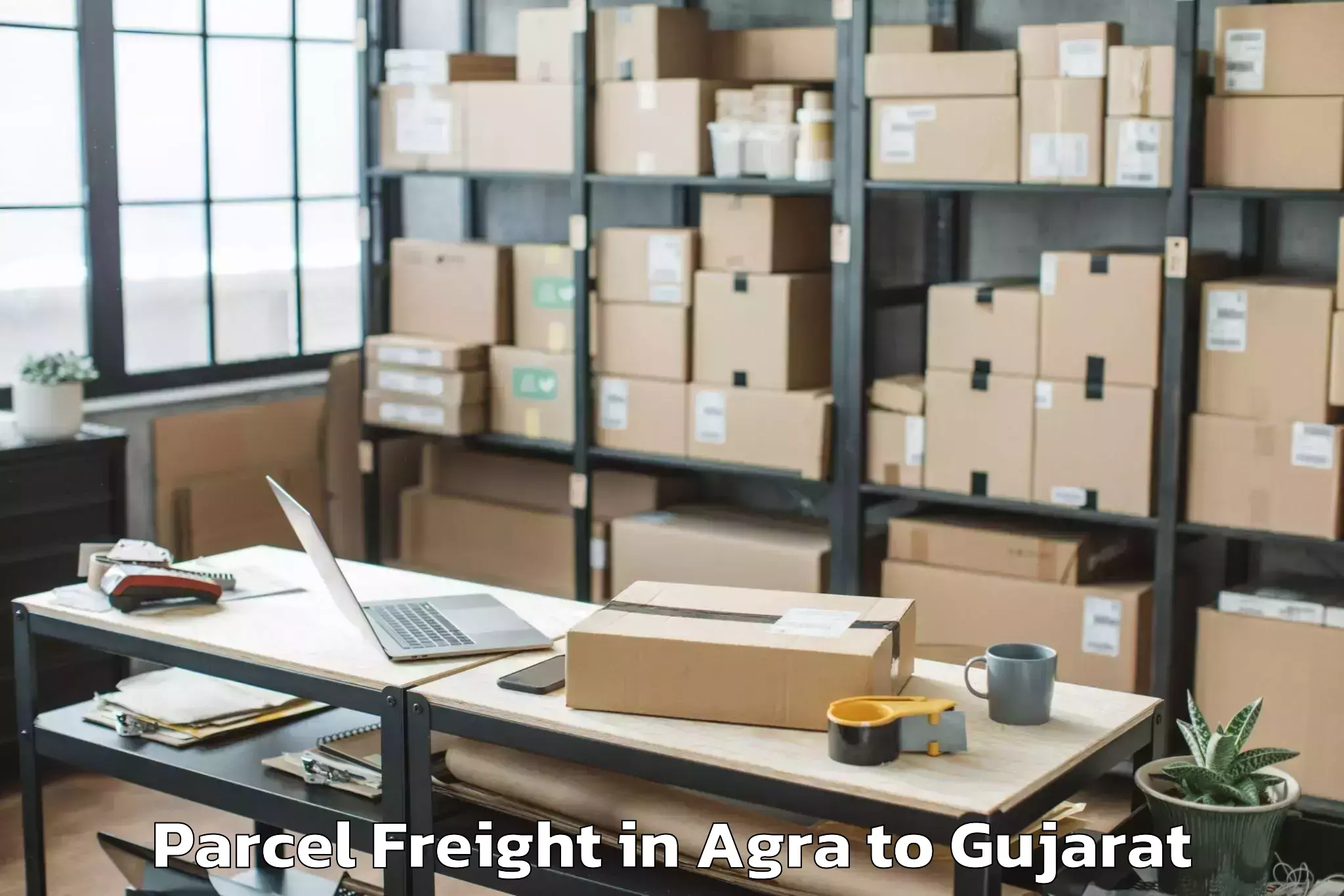 Comprehensive Agra to Kadi Sarva Vishwavidyalaya Gan Parcel Freight